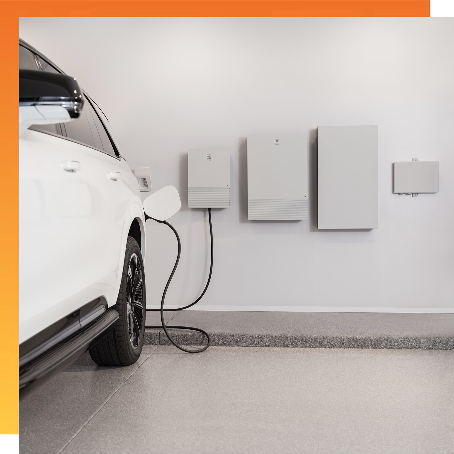White EV plugged into the GM Energy V2H Bundle